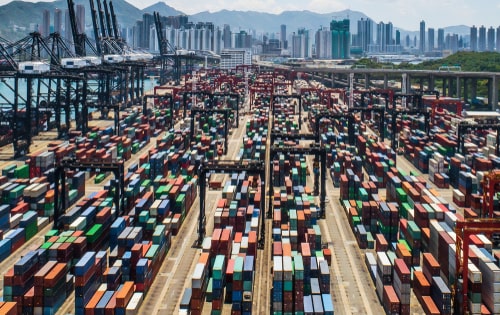 Containers at a port waiting to be transported across the world.